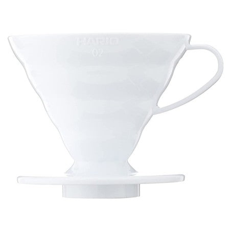 Hario V60 Plastic Dripper 01 in clear, white, and red, used for pourover coffee brewing, with a conical design and ridged interior.